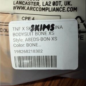 SKIMS Bodysuit in Bone